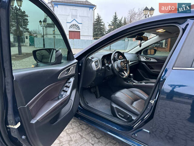 Синий Мазда 3, объемом двигателя 2 л и пробегом 117 тыс. км за 13400 $, фото 11 на Automoto.ua