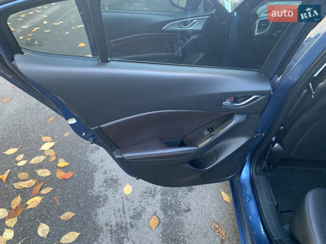 Синій Мазда 3, об'ємом двигуна 2 л та пробігом 58 тис. км за 13700 $, фото 12 на Automoto.ua