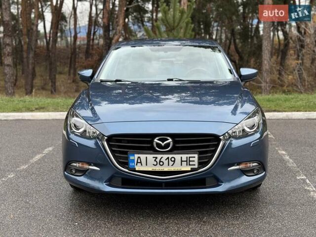 Синий Мазда 3, объемом двигателя 1.5 л и пробегом 60 тыс. км за 15200 $, фото 2 на Automoto.ua