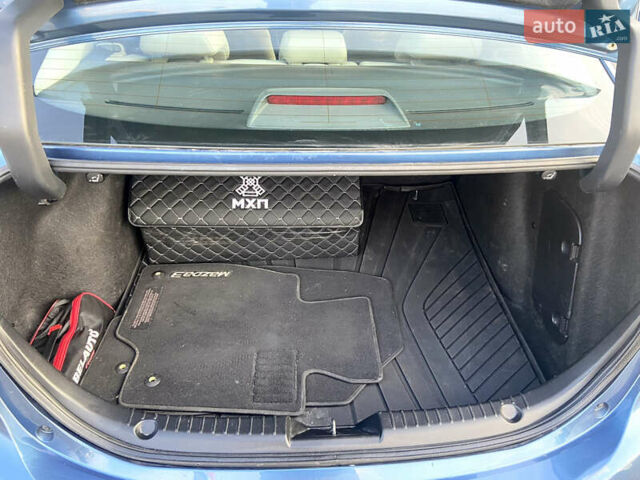 Синий Мазда 3, объемом двигателя 2 л и пробегом 144 тыс. км за 11900 $, фото 17 на Automoto.ua