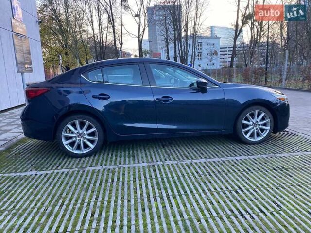 Синий Мазда 3, объемом двигателя 2 л и пробегом 105 тыс. км за 14500 $, фото 6 на Automoto.ua