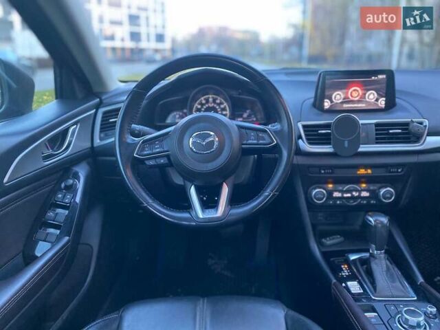 Синий Мазда 3, объемом двигателя 2 л и пробегом 105 тыс. км за 14500 $, фото 3 на Automoto.ua