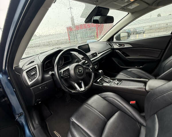 Синий Мазда 3, объемом двигателя 2 л и пробегом 161 тыс. км за 13000 $, фото 17 на Automoto.ua