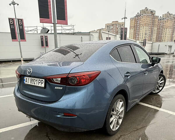 Синий Мазда 3, объемом двигателя 2 л и пробегом 161 тыс. км за 13000 $, фото 9 на Automoto.ua
