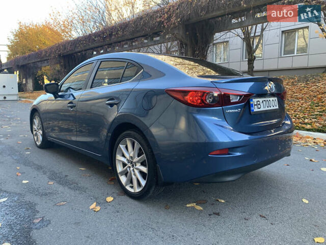 Синий Мазда 3, объемом двигателя 2 л и пробегом 58 тыс. км за 12900 $, фото 4 на Automoto.ua