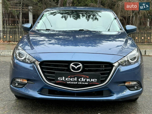 Синий Мазда 3, объемом двигателя 2 л и пробегом 124 тыс. км за 14299 $, фото 1 на Automoto.ua