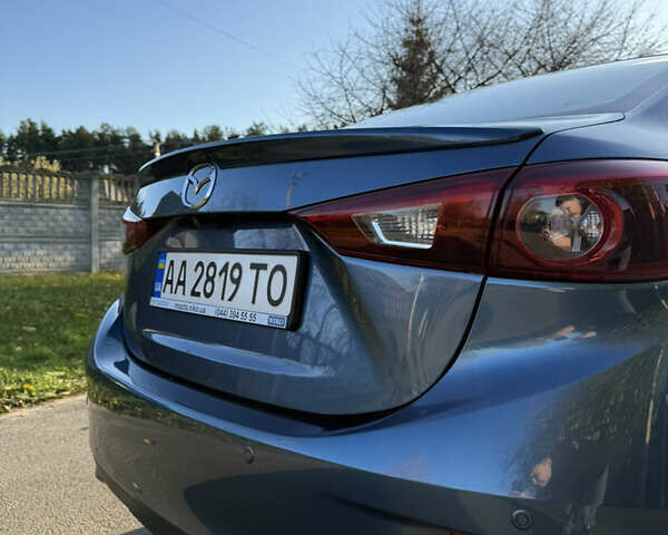 Синий Мазда 3, объемом двигателя 1.5 л и пробегом 77 тыс. км за 14700 $, фото 6 на Automoto.ua