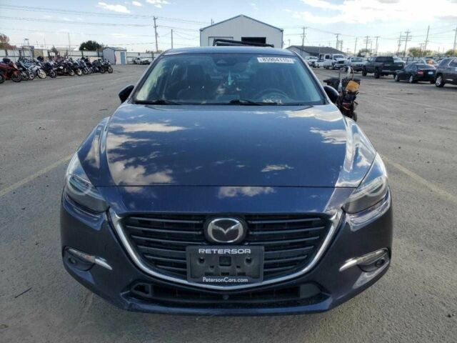 Синий Мазда 3, объемом двигателя 0 л и пробегом 52 тыс. км за 2000 $, фото 4 на Automoto.ua