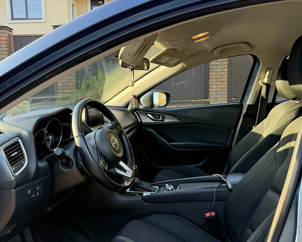Синий Мазда 3, объемом двигателя 1.5 л и пробегом 77 тыс. км за 14700 $, фото 9 на Automoto.ua