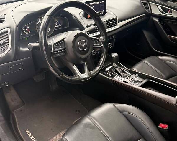 Синий Мазда 3, объемом двигателя 2.5 л и пробегом 79 тыс. км за 15500 $, фото 3 на Automoto.ua