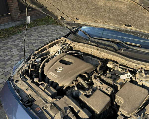 Синий Мазда 3, объемом двигателя 1.5 л и пробегом 77 тыс. км за 14700 $, фото 16 на Automoto.ua