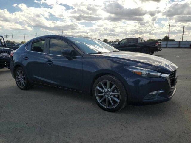 Синий Мазда 3, объемом двигателя 0 л и пробегом 52 тыс. км за 2000 $, фото 3 на Automoto.ua