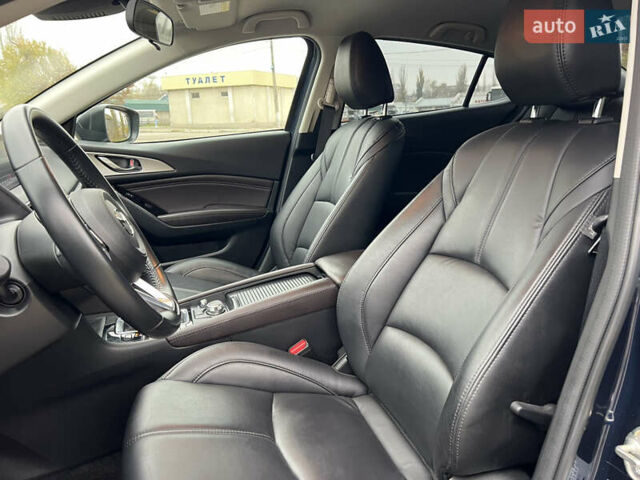 Синий Мазда 3, объемом двигателя 2.49 л и пробегом 65 тыс. км за 14599 $, фото 4 на Automoto.ua