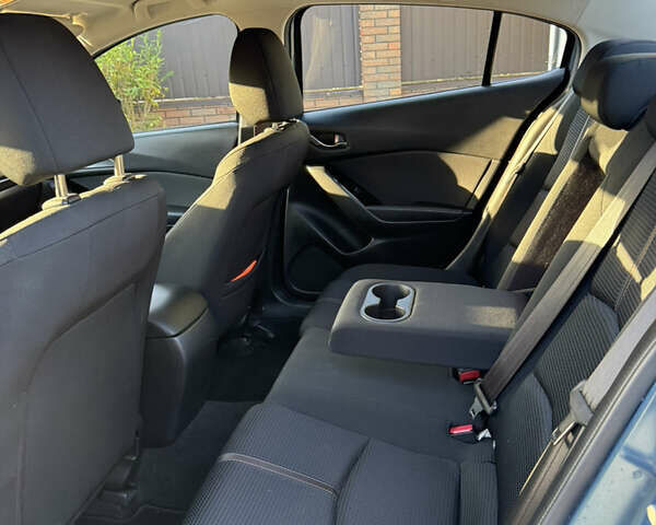 Синий Мазда 3, объемом двигателя 1.5 л и пробегом 77 тыс. км за 14700 $, фото 8 на Automoto.ua