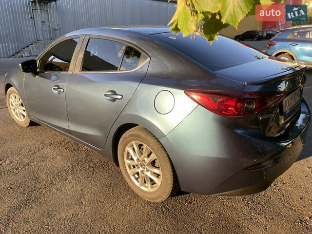 Синий Мазда 3, объемом двигателя 1.5 л и пробегом 54 тыс. км за 14100 $, фото 3 на Automoto.ua