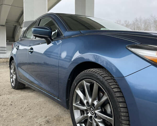 Синій Мазда 3, об'ємом двигуна 2.49 л та пробігом 51 тис. км за 14200 $, фото 13 на Automoto.ua