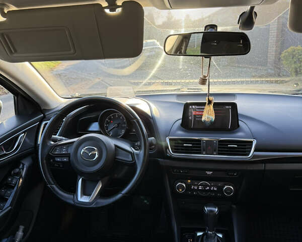 Синий Мазда 3, объемом двигателя 1.5 л и пробегом 77 тыс. км за 14700 $, фото 12 на Automoto.ua