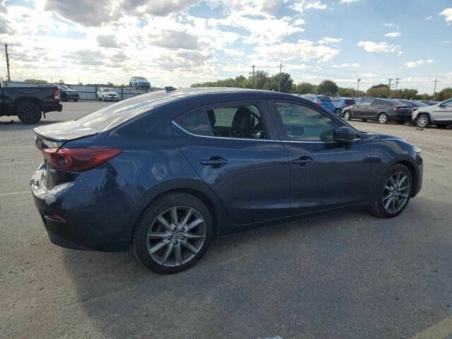 Синий Мазда 3, объемом двигателя 0 л и пробегом 52 тыс. км за 2000 $, фото 2 на Automoto.ua