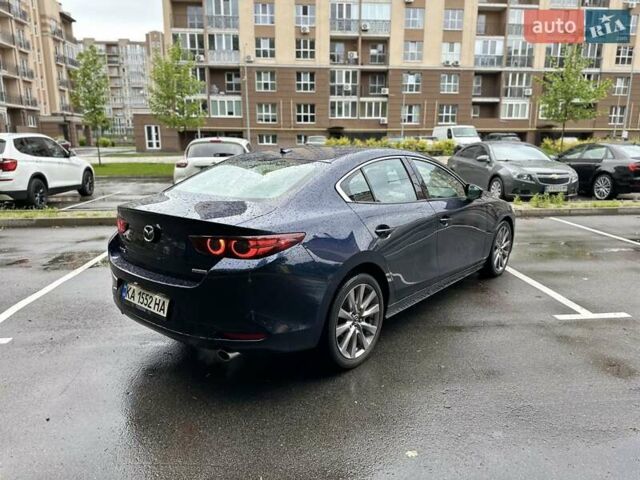 Синий Мазда 3, объемом двигателя 2.49 л и пробегом 75 тыс. км за 18000 $, фото 7 на Automoto.ua