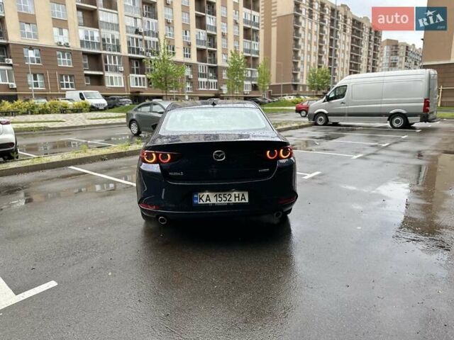 Синий Мазда 3, объемом двигателя 2.49 л и пробегом 75 тыс. км за 18000 $, фото 6 на Automoto.ua