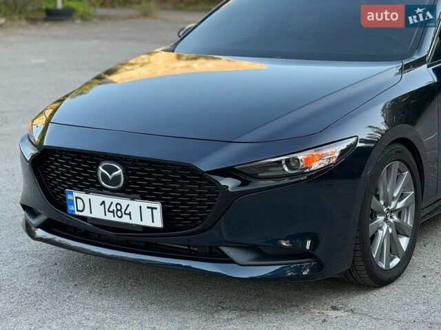 Синий Мазда 3, объемом двигателя 2.49 л и пробегом 66 тыс. км за 16000 $, фото 2 на Automoto.ua