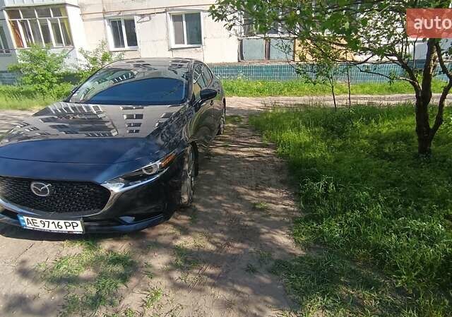 Синий Мазда 3, объемом двигателя 2.49 л и пробегом 37 тыс. км за 16000 $, фото 2 на Automoto.ua