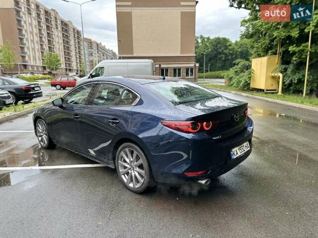 Синий Мазда 3, объемом двигателя 2.49 л и пробегом 75 тыс. км за 18000 $, фото 2 на Automoto.ua