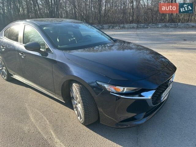 Синий Мазда 3, объемом двигателя 2.49 л и пробегом 103 тыс. км за 15600 $, фото 1 на Automoto.ua