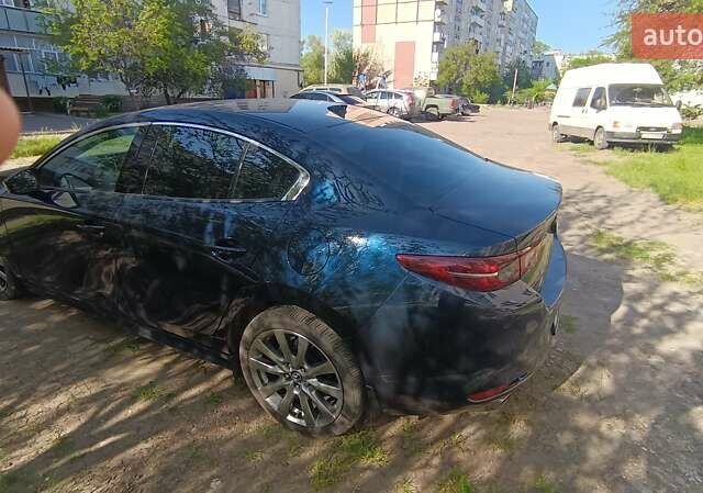 Синий Мазда 3, объемом двигателя 2.49 л и пробегом 37 тыс. км за 16000 $, фото 4 на Automoto.ua