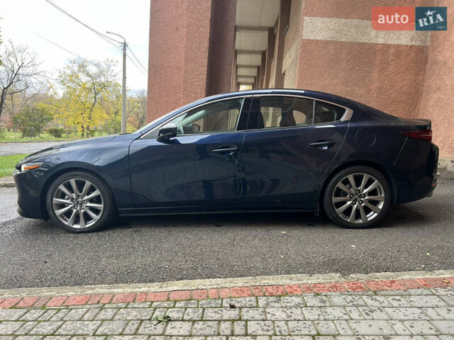 Синий Мазда 3, объемом двигателя 2.49 л и пробегом 50 тыс. км за 18000 $, фото 3 на Automoto.ua