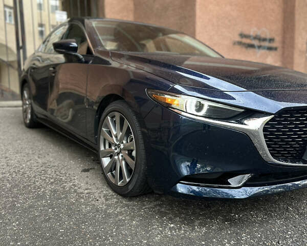 Синий Мазда 3, объемом двигателя 2.49 л и пробегом 50 тыс. км за 18000 $, фото 11 на Automoto.ua