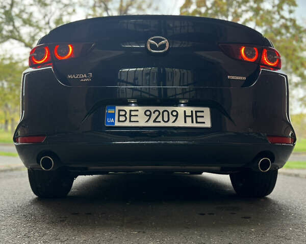 Синий Мазда 3, объемом двигателя 2.49 л и пробегом 50 тыс. км за 18000 $, фото 5 на Automoto.ua