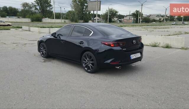 Синий Мазда 3, объемом двигателя 2.49 л и пробегом 93 тыс. км за 16500 $, фото 6 на Automoto.ua