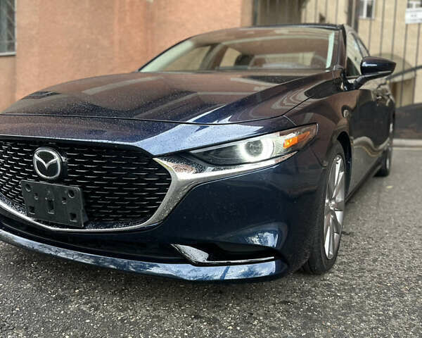 Синий Мазда 3, объемом двигателя 2.49 л и пробегом 50 тыс. км за 18000 $, фото 12 на Automoto.ua