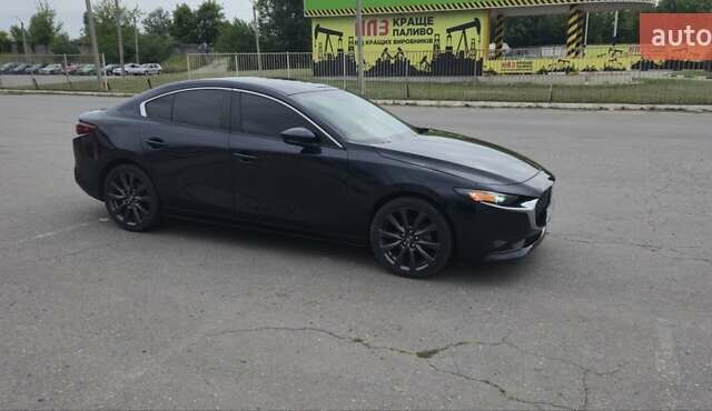 Синий Мазда 3, объемом двигателя 2.49 л и пробегом 93 тыс. км за 16500 $, фото 1 на Automoto.ua