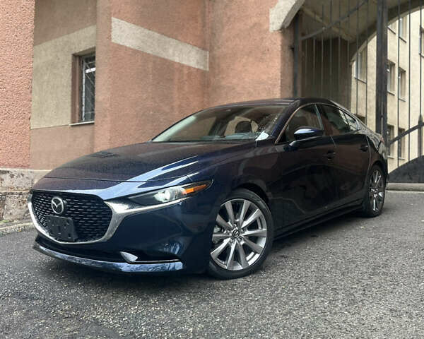 Синий Мазда 3, объемом двигателя 2.49 л и пробегом 50 тыс. км за 18000 $, фото 2 на Automoto.ua