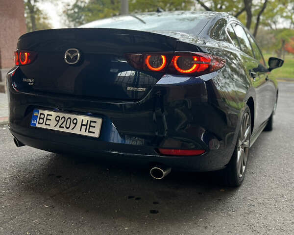 Синий Мазда 3, объемом двигателя 2.49 л и пробегом 50 тыс. км за 18000 $, фото 7 на Automoto.ua