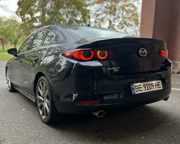 Синий Мазда 3, объемом двигателя 2.49 л и пробегом 50 тыс. км за 18000 $, фото 4 на Automoto.ua