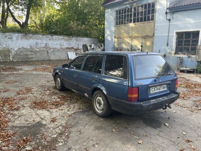 Синий Мазда 3, объемом двигателя 1.8 л и пробегом 300 тыс. км за 850 $, фото 3 на Automoto.ua