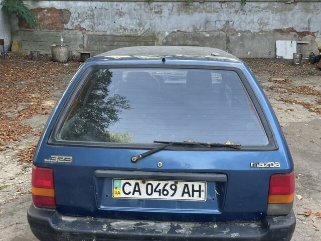 Синий Мазда 3, объемом двигателя 1.8 л и пробегом 300 тыс. км за 850 $, фото 2 на Automoto.ua