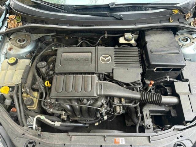 Мазда 3 2007 в Киеве на Automoto.ua Синий Мазда 3, объемом двигателя 1.6 л и пробегом 167 тыс. км за 5600 $, фото 9 на Automoto.ua