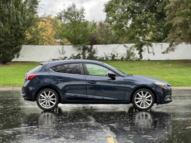 Синий Мазда 3, объемом двигателя 2.5 л и пробегом 54 тыс. км за 11500 $, фото 6 на Automoto.ua