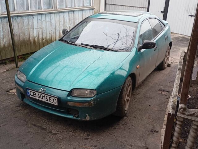 Зеленый Мазда 3, объемом двигателя 1.5 л и пробегом 250 тыс. км за 2000 $, фото 2 на Automoto.ua