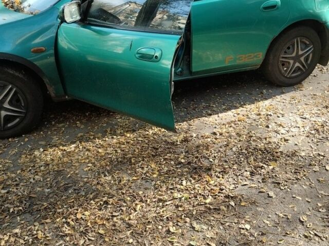 Зелений Мазда 3, об'ємом двигуна 1.8 л та пробігом 237 тис. км за 716 $, фото 2 на Automoto.ua