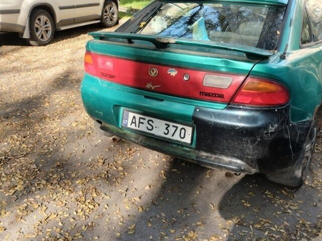 Зелений Мазда 3, об'ємом двигуна 1.8 л та пробігом 237 тис. км за 716 $, фото 1 на Automoto.ua