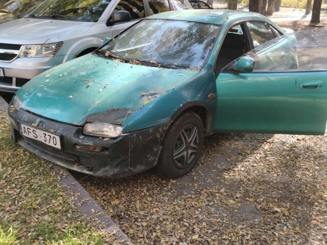 Зелений Мазда 3, об'ємом двигуна 1.8 л та пробігом 237 тис. км за 716 $, фото 3 на Automoto.ua