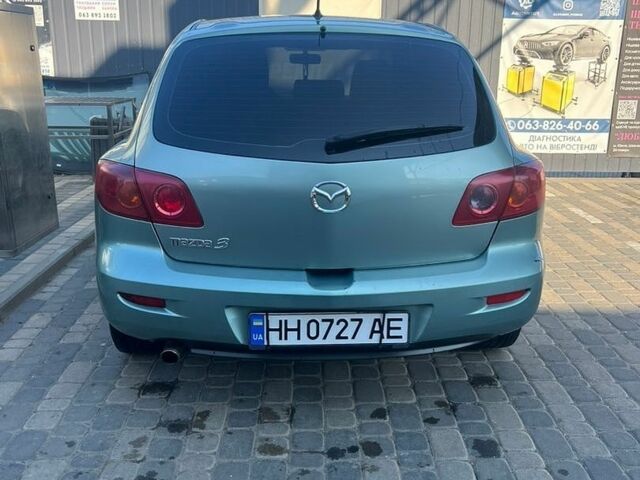 Зелений Мазда 3, об'ємом двигуна 1.6 л та пробігом 340 тис. км за 3800 $, фото 2 на Automoto.ua