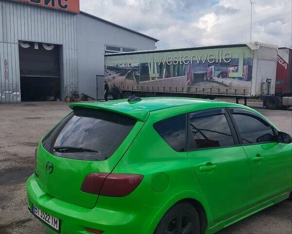 Зелений Мазда 3, об'ємом двигуна 1.4 л та пробігом 260 тис. км за 3200 $, фото 3 на Automoto.ua