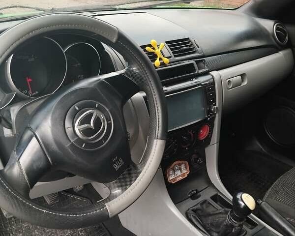 Зелений Мазда 3, об'ємом двигуна 1.4 л та пробігом 260 тис. км за 3200 $, фото 7 на Automoto.ua