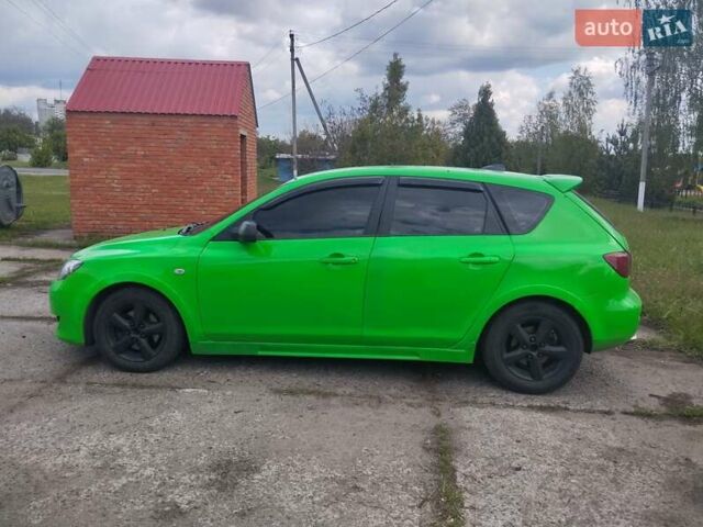 Зелений Мазда 3, об'ємом двигуна 1.4 л та пробігом 260 тис. км за 3200 $, фото 5 на Automoto.ua